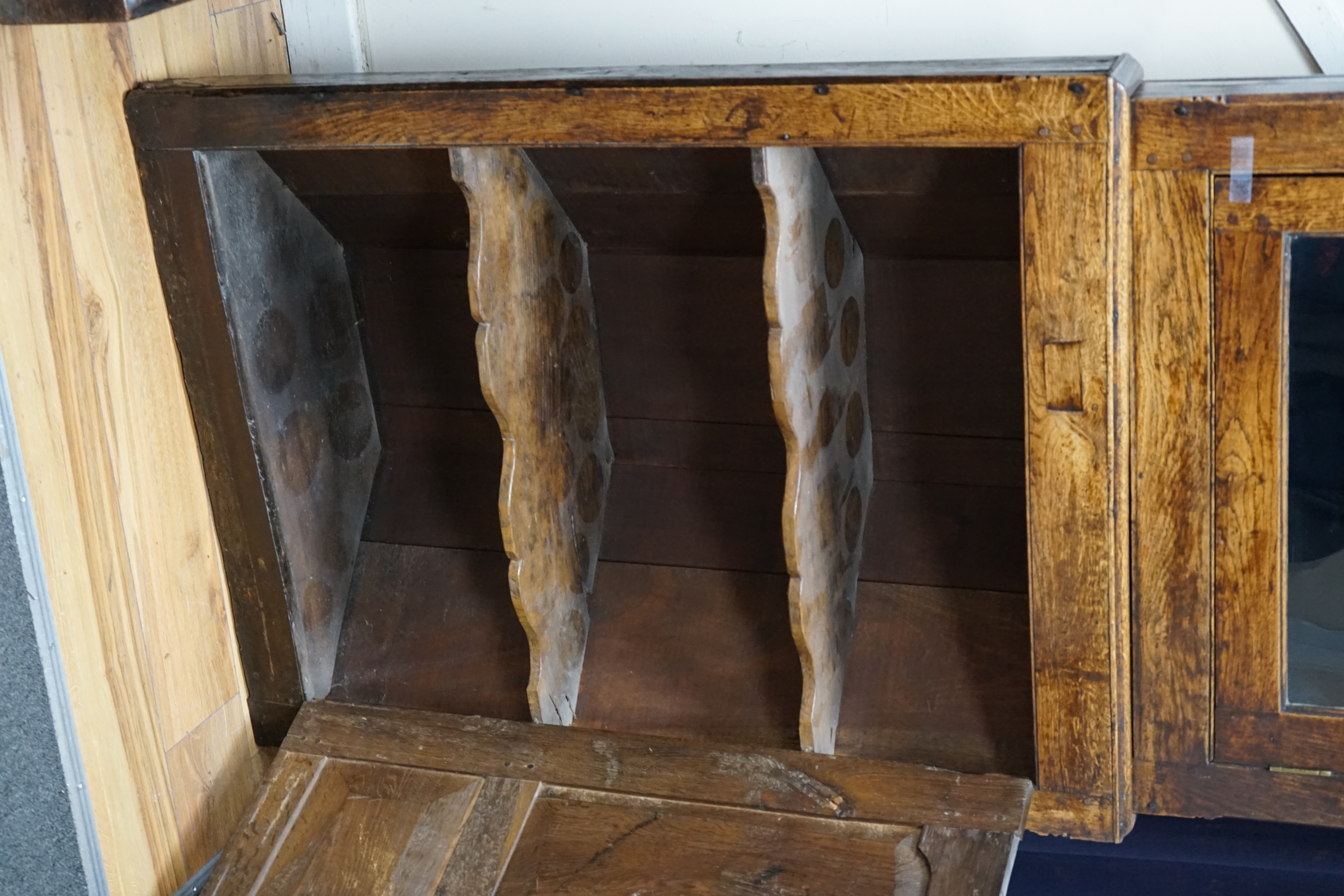 An 18th century two-sectional Provincial oak standing corner cupboard, width 80cm depth 30cm height 206cm